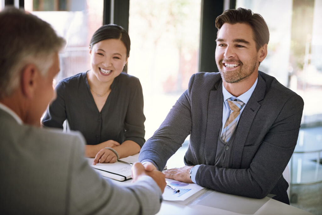 Welcoming a new hire during an interview, highlighting excitement and opportunity.